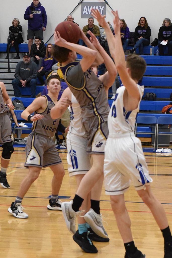 Remy August battles his way to a two-point lay-up! (John Stimpson/contributed photo.)