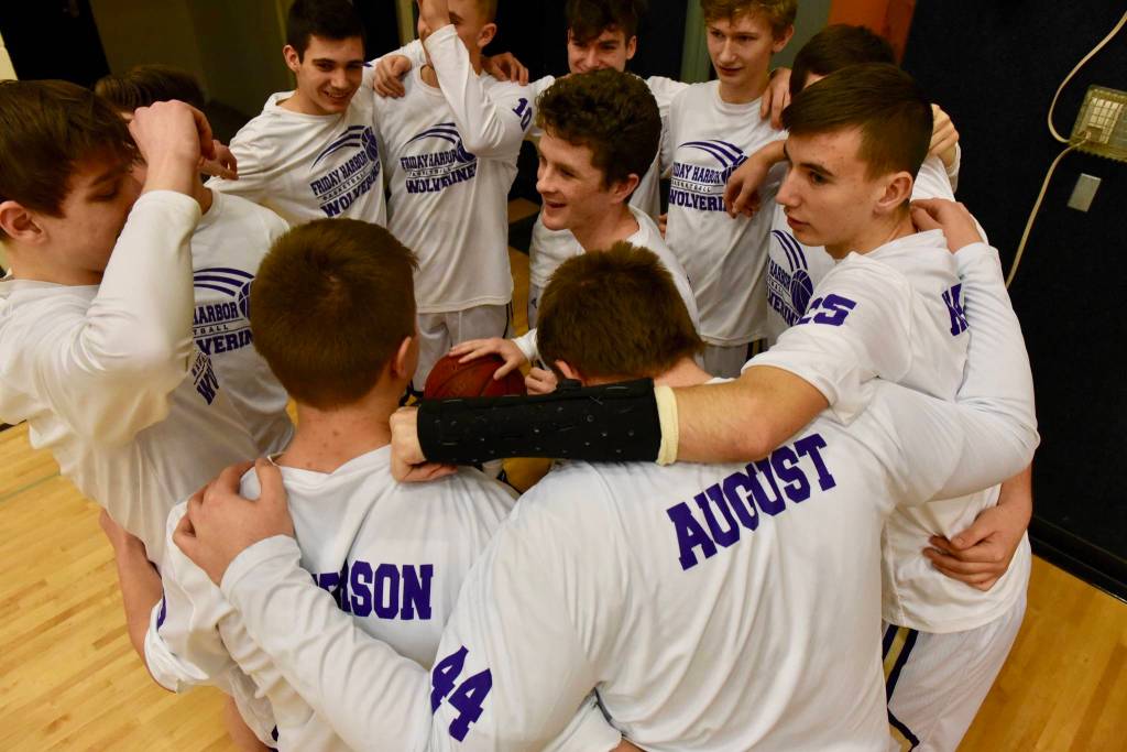 Ethan Germain leads Wolverines in building team pregame spirit. (John Stimpson/contributed photo.)