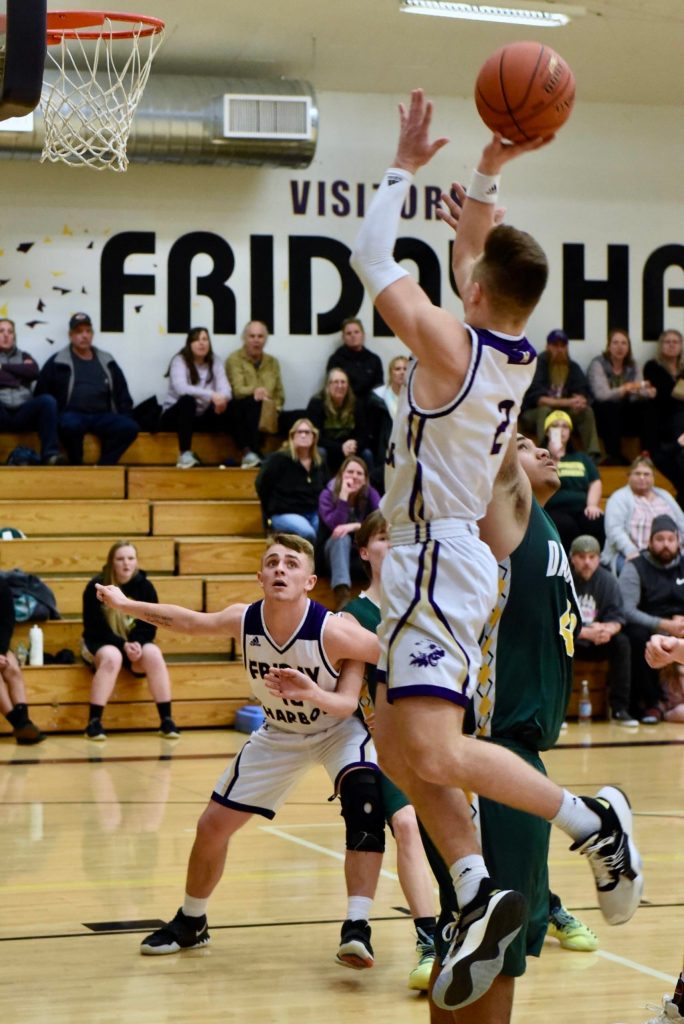 Kyson Jackson shoots for two points. (John Stimpson/contributed photo.)