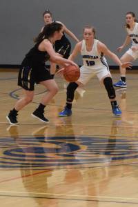 Fallon Taylor brings the ball up court to start the offensive play. (John Stimpson/contributed photo.)
