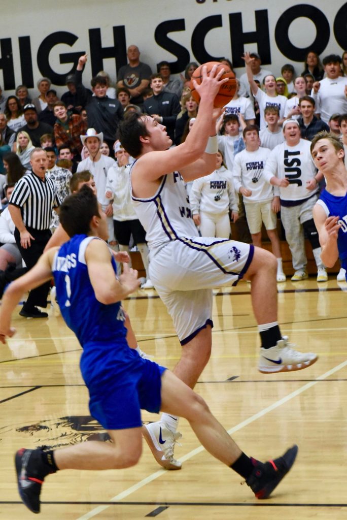 Gavin Mason excites the crowd with his drive to the basket. (John Stimpson/contributed photo.)