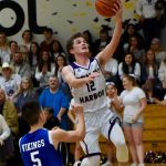 Ethan Germain flies up to secure a two-point lay in. (John Stimpson/contributed photo.)