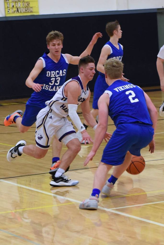 Kyson Jackson weaves his way up court toward the basket. (John Stimpson/contributed photo.)