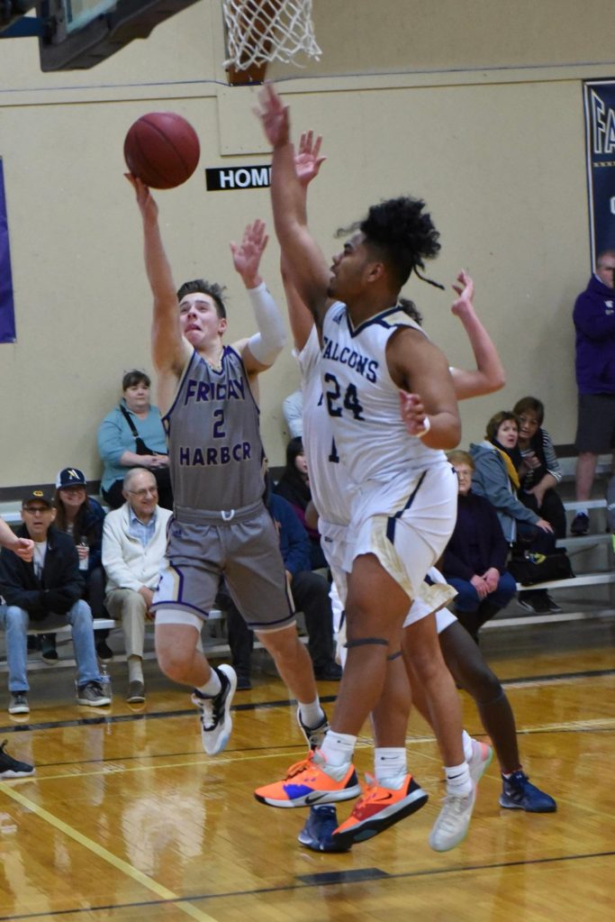 Kyson Jackson battles his way to a two-point shot! (John Stimpson/contributed photo)