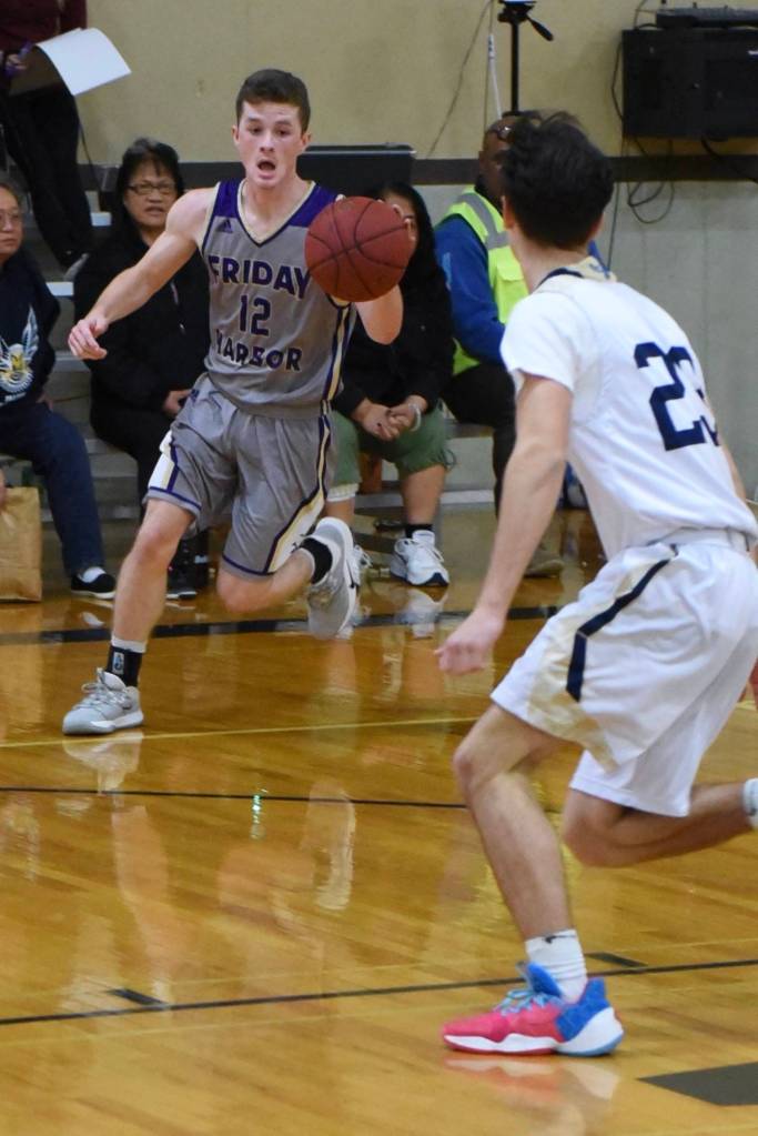 Ethan Germain brings the ball up court to start the offensive play. (John Stimpson/contributed photo)