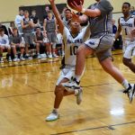 Big Mac August ends his fast-break drive with a two-point layup. (John Stimpson/contributed photo)