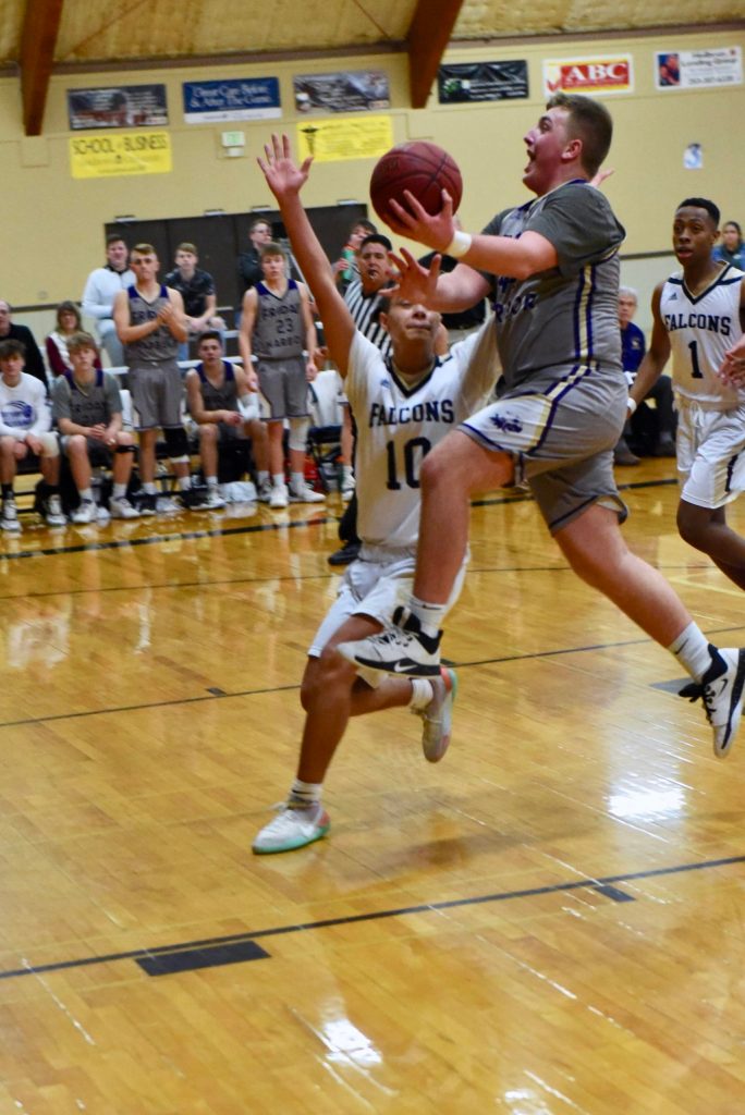 Big Mac August ends his fast-break drive with a two-point layup. (John Stimpson/contributed photo)