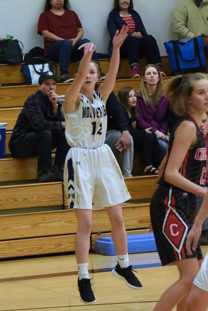 Olivia Germain shoots for two from the corner. (John Stimpson/contributed photo.)