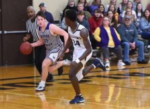 Gavin Mason leads a fast break toward the basket. (John Stimpson/contributed photo)