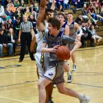 Remy August drives to the basket for two points. (John Stimpson/contributed photo.)