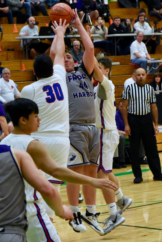 Teagan Big Mac August shoots for two points under extreme defensive pressure! (John Stimpson/contributed photo.)