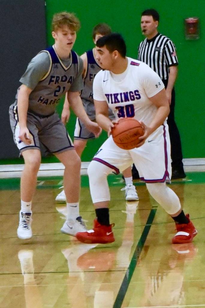 Cameron Wilson puts defensive pressure on the Vikings. (John Stimpson/contributed photo.)