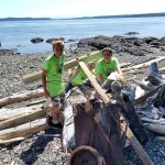 Brendan Reiff, Malachi Cullen and Aiden Greene participate in a Youth Conservation Corpse beach clean-up at Jackson Beach in July 2019. (Contributed photo)