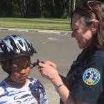 EMT Lainey Volk with community member during a bike fitting session pre-COVID-19. (Contributed photo)