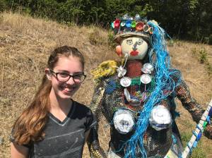 Contributed photo                                Kaia (left) with a mermaid made of litter at the Lopez Dump.