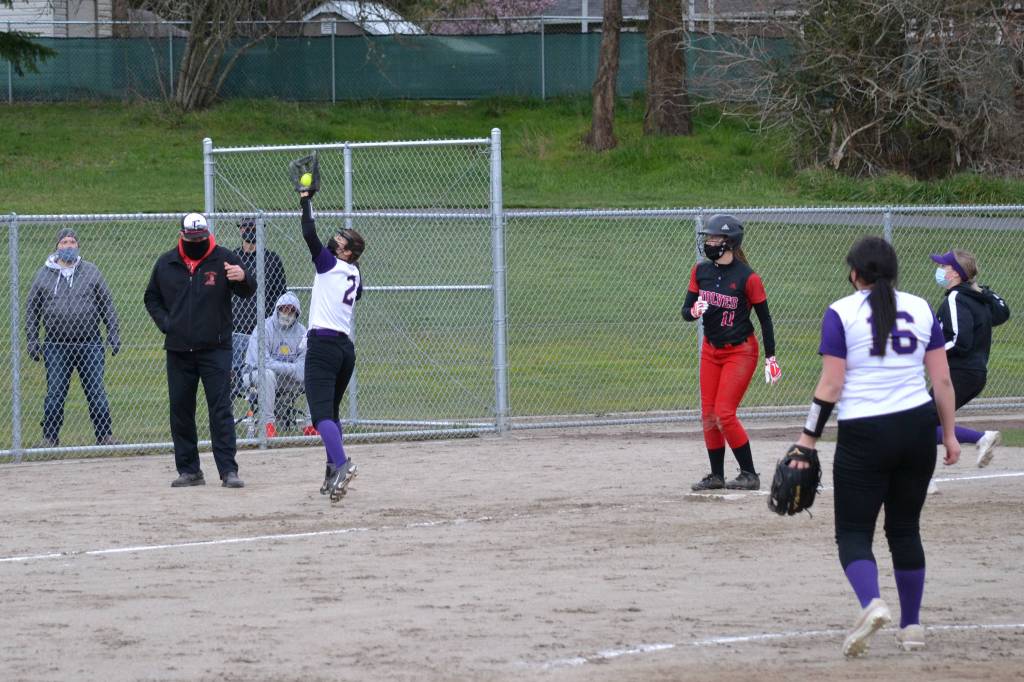 Freshman Sheya Welty getting an out at third base against Coupeville on March 19. The girls lost 8-3 at home against the Wolves. (Jennifer Ayers/contributed photo)