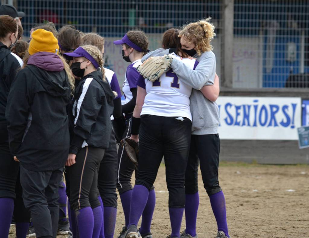Raylee Miniken (starting pitcher) hugging closing pitcher Audrey Allen at a game against the Orcas Vikings on March 27, 2021. (Jennifer Ayers photo)