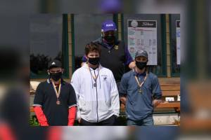 Individual winners from left to right in front: Ananda Velo, Orcas, third; Jack Mason, Friday Harbor, second; Ethan Havel, Friday Harbor, first. Back row: Friday Harbor Coach Jack Rice.