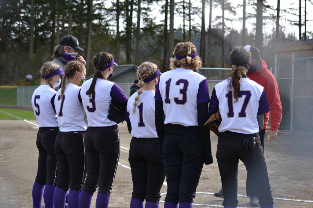 The seniors meet to discuss strategy. (Jennifer Ayers photo)