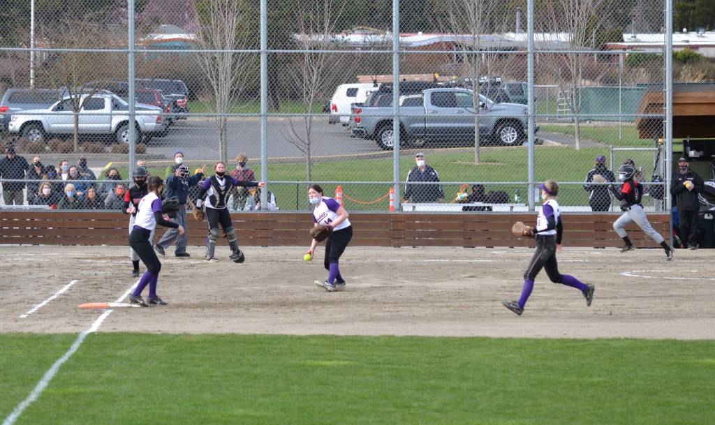 Audrey Allen throws to first for the out. (Jennifer Ayers photo)