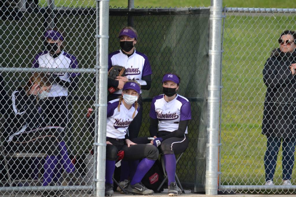 Fallon Taylor, Ellee Perkins, and Darcy Ayers in the dugout. (Jennifer Ayers photo)