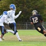 Wolverine Jaxson Waldron, #12, sprints for extra yardage. (John Stimpson photo)