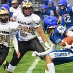 Connor Haines, #14, and Chris Gustafson, #24, to stop the La Connor Braves in their tracks. (John Stimpson photo)
Connor Haines, #14, and Chris Gustafson, #24, to stop the La Connor Braves in their tracks. (John Stimpson photo)