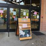 Signs posted outside of the Marketplace entrance
Photo by Sienna Boucher