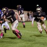 John Stimpson photo
Wolverine Connor Haines #14 and Cody Anderson #21 make their way up field.