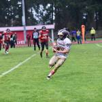 John Stimpson photo
Wolverine Nathan Posenjak #10 catches a pass.