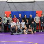 Staff photo//Sienna Boucher.
Back row left to right: Coach Stephan, Coach Sabrina, Coach Tad, Stephen N., Kaiden I., Riley B., Coach Todd, Coach Austin, Coach James. Bottom row left to right: Triston B., Manager Ellie, Jillian O., Stella C., Gavin A., Kieran C.