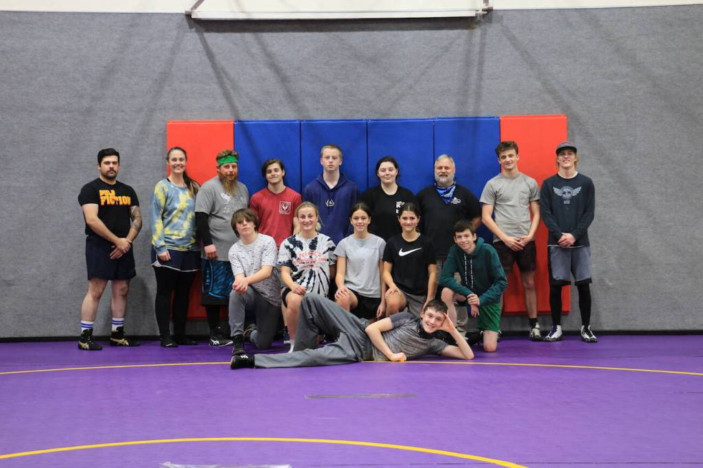 Staff photo//Sienna Boucher.
Back row left to right: Coach Stephan, Coach Sabrina, Coach Tad, Stephen N., Kaiden I., Riley B., Coach Todd, Coach Austin, Coach James. Bottom row left to right: Triston B., Manager Ellie, Jillian O., Stella C., Gavin A., Kieran C.