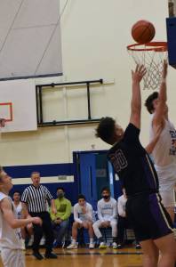 John Stimpson / Contributed photo
Chris Gustafson lays one up.