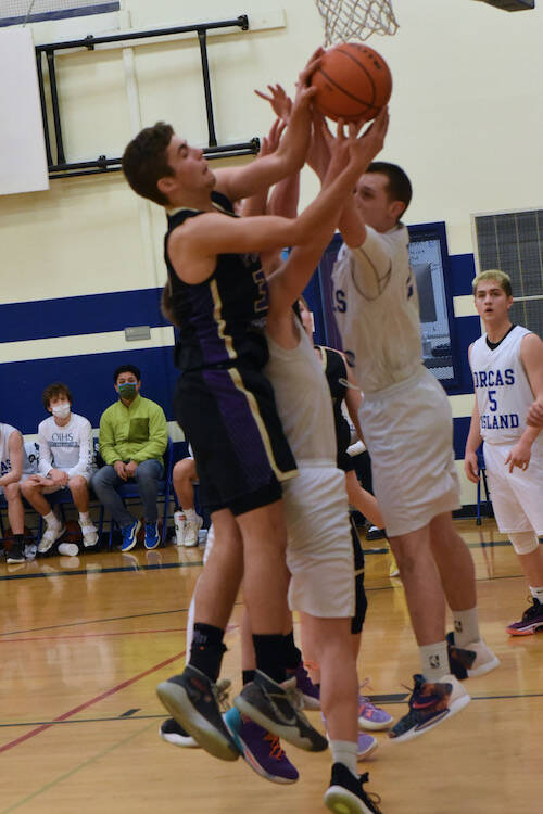 John Stimpson / Contributed photo
Jasper Williamson underneath with the rebound.