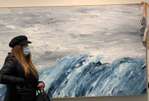 Contributed photo
Jennifer Jones describing her painting for the docents before the show opening.