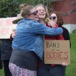Heather Spaulding / Staff photo Ramona Fierl gets a hug from a supporter