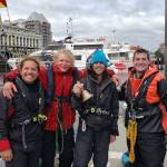 The Team Elsewhere crew pose for the camera after successfully completing the first leg of the race, known as "The Proving Ground," in Victoria B.C. From left, First Mate Martin Gibson, Odin Smith (the youngest person to complete the R2AK), Captain Rhys Balmer, and Josiah Ball.