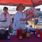 Kari Koski provides a refreshing beverage during the San Juan Summer Arts Festival.