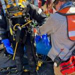 Contributed photo by Washington Department of Ecology
A Global Dive & Salvage diver prepares to dive down to the Aleutian Isle, resting over 200 feet below the surface.