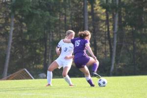 Heather Spaulding / Staff photo Meg Carrier defends the ball
