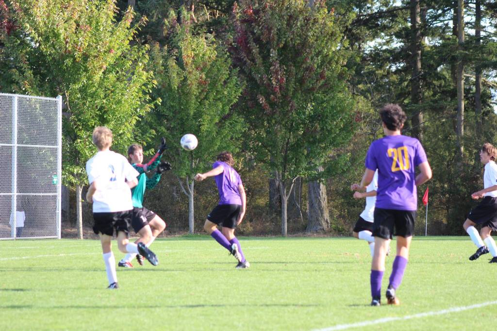Heather Spaulding / Staff photo
Wolverines put the pressure on LaConner's goalie.