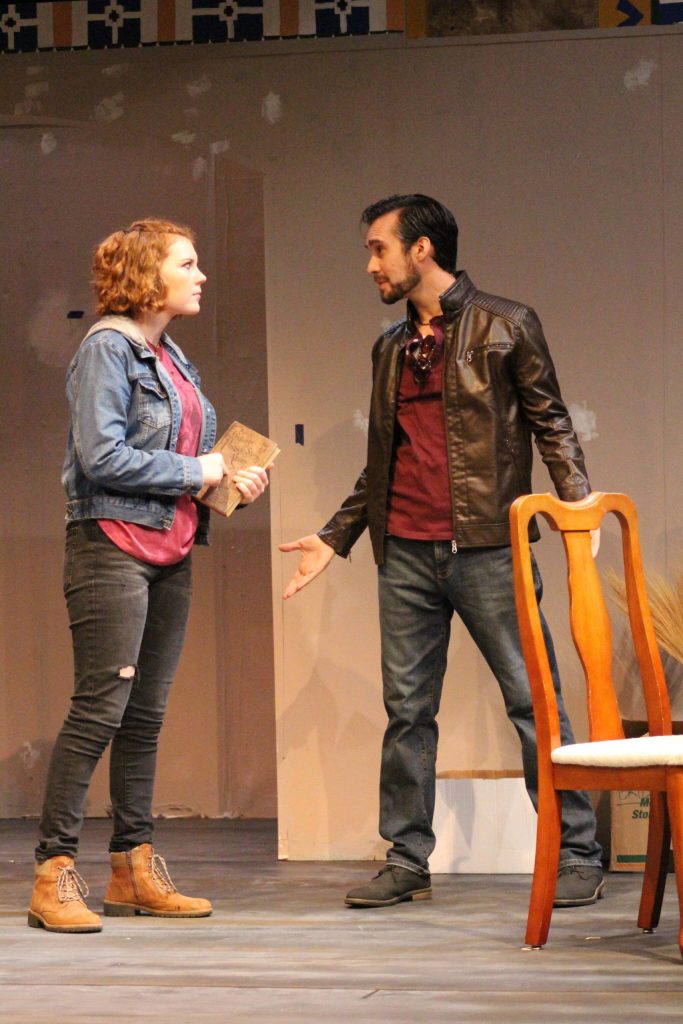 Heather Spaulding  Staff photo
Jackie (Anne Maria Ryan) discusses the stamp collection with Dennis (Adam Parrett)