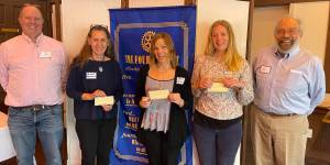 Contributed photo by the Rotary Club of San Juan Islands left to right: Rotary President, Rick Hughes; Jennifer Armstrong, Joyce L. Sobel Family Resource Center; Sara Werling, Family Umbrella Group; Zoe Froyland, Mobile Dental Van; Jim Corenman, The Sports Car Club of San Juan Islands