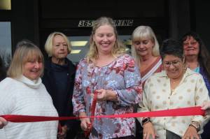 Heather Spaulding  Staff photo
Cristin Felso prepares to cut the ribbon