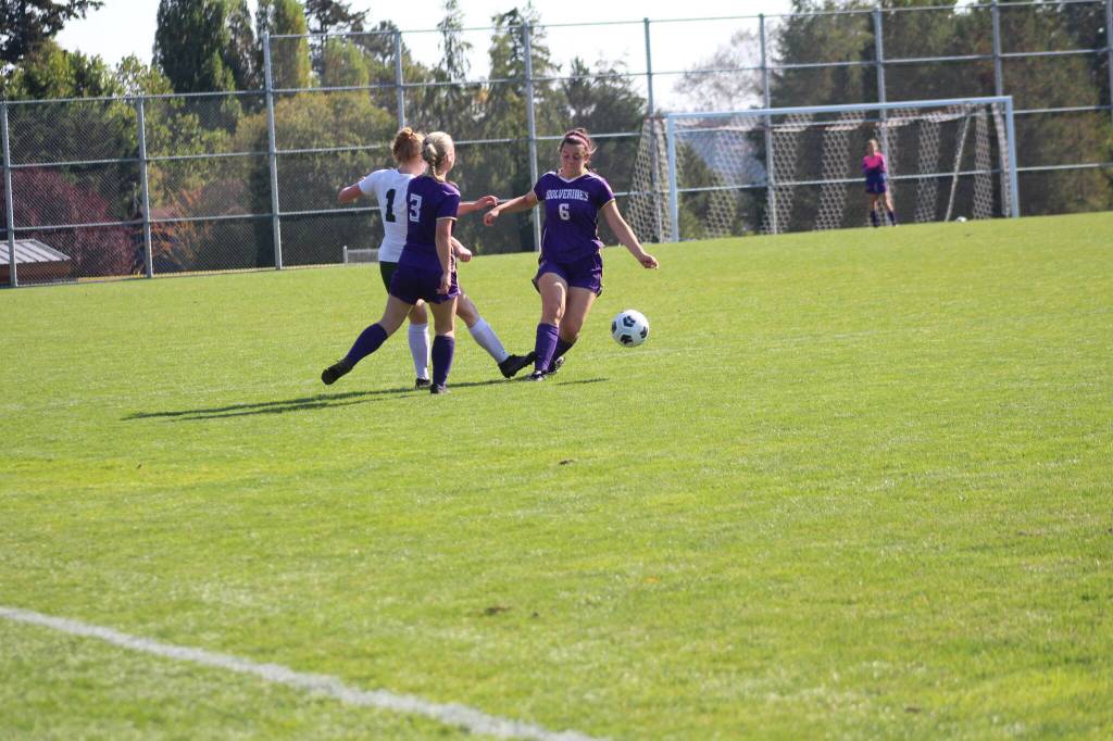 Heather Spaulding \ Staff photo
Nyla Pieples helps Bella Ross defend the ball.