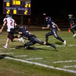 Contributed photo by Kathryn Wheeler
The defense rushes to tackle a touchdown run