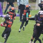 Heather Spaulding \ Staff photo
Pee Wees run to make a touchdown.