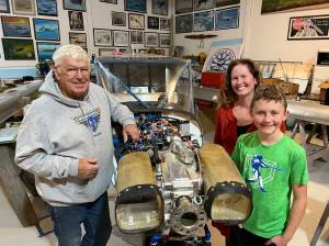 Contributed photo by Lauren Wall Left to right: Bob Jamieson, Lauren Wall and Nolan Wall in front of the airplane Zenith Bob and Nolan are building.
