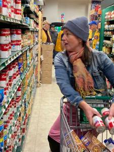 Contributed photo by the Friday Harbor
Food Bank Food Bank manager Rachelle Radonski grabbing what she can!