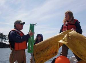 Contributed photo by IOSA
Julie Knight with an oil boom.